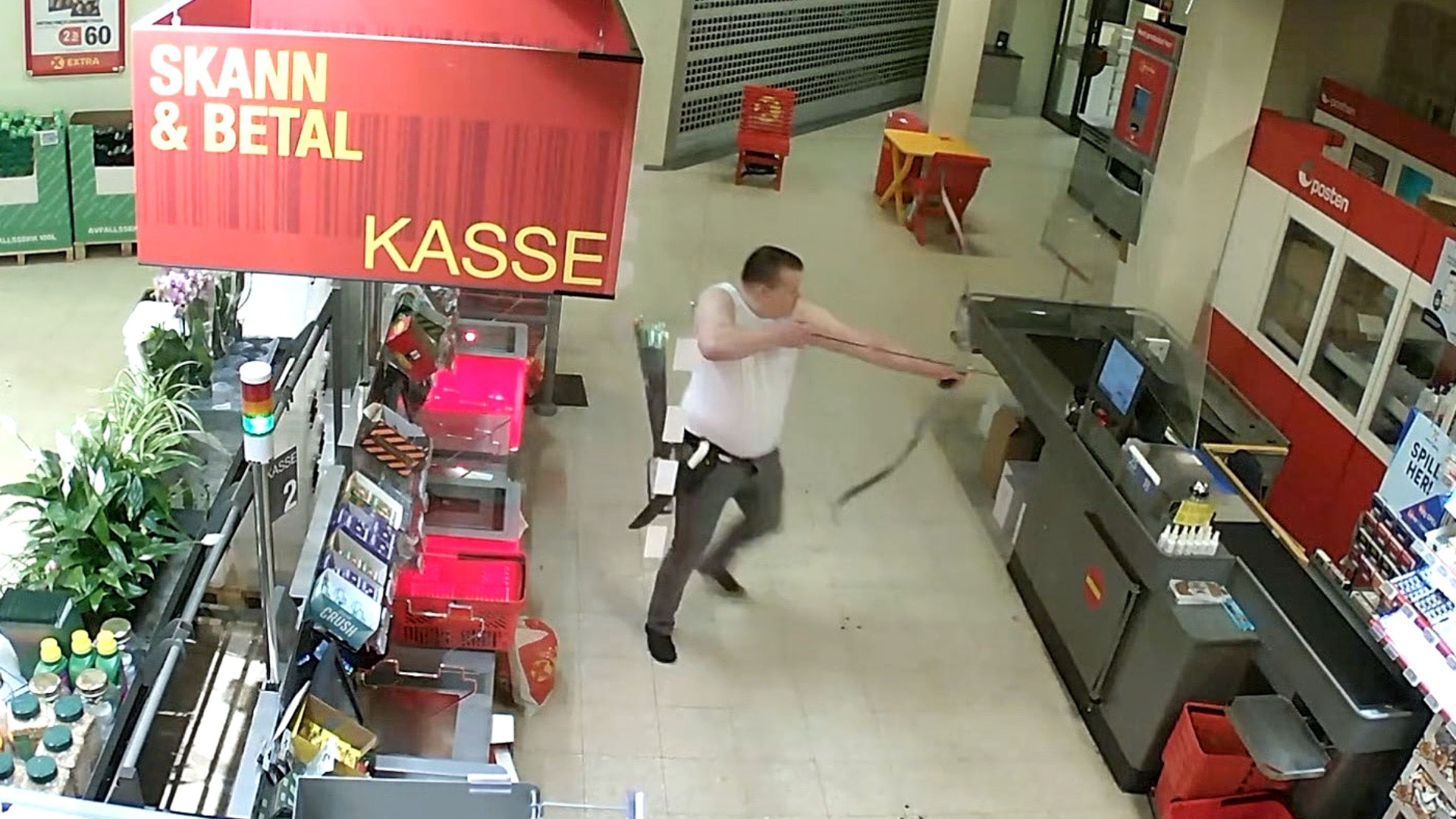 Her angriper drapsmannen i butikken